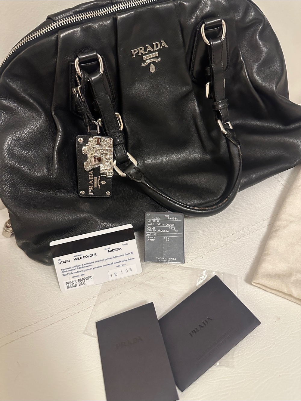 Prada Black Leather Duffel with Silver Hardware